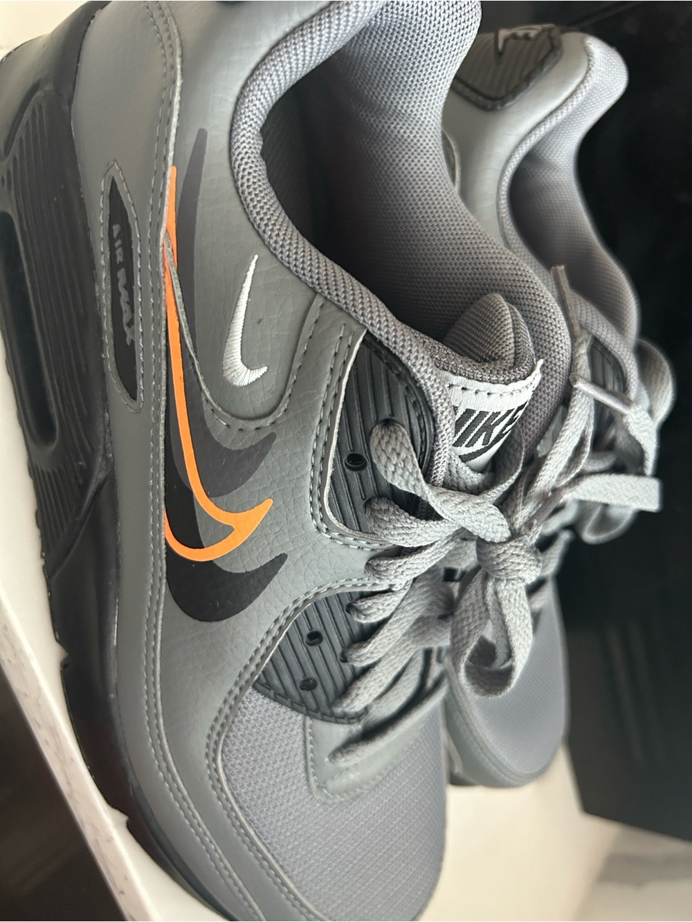 Nike Men’s Grey Sneakers with Orange Swoosh Accent